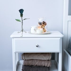 Blue Rose on Bedside Table