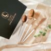 Dine in style with the CLINQ White & Copper Cutlery Set (16pc). Durable stainless steel with copper plating and white handles, beautifully gift-boxed.